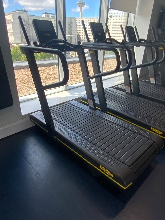 Technogym Skillrun TX 500 treadmill with 10-inch console in black